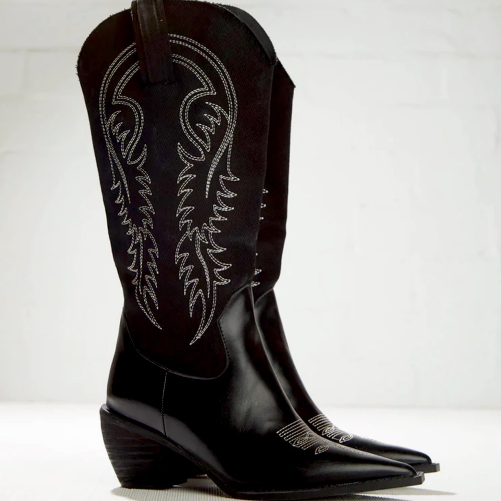 Brand new, never worn black cowboy boot bought from Peppermayo